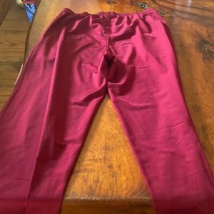 Retro adidas pants red with blue striping.